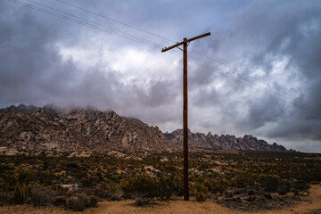 Mojave National Preserve Desert Wilderness Landscape Series, Dramatic cloudscape over electricity...