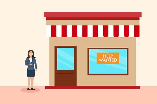 Store with help wanted job recruitment placard on the window