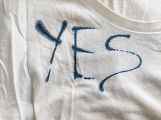 Writing Yes on T-Shirt with Ink