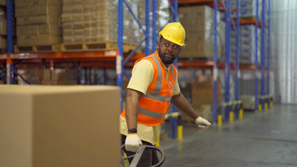 Portrait of black man worker working in large warehouse retail store industry factory. Rack of stock storage. Cargo in ecommerce and logistic concept. Depot. People lifestyle. Shipment service.