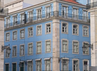 Fototapeta na wymiar Sky blue stone building in Lisbon, Portugal