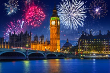Papier Peint photo Tower Bridge New years fireworks display over the Big Ben and Westminster Bridge in London, UK