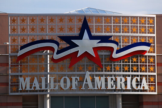 Mall of America, the Largest Shopping Mall in the United States, welcomes visitors with a large patriotic sign above the entrance