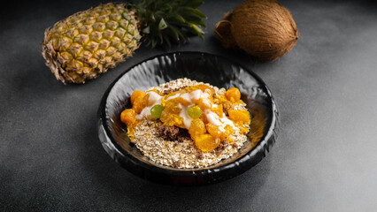 whole grain oatmeal with rapid protein resource and our special tropical fruits sauce served in dish isolated on table top view of arabic food