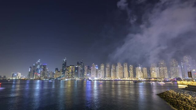 15
Time lapse of firework between  Jumeirah beach and blue water al ain wheel at night.
