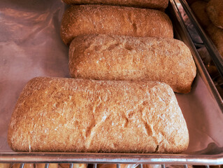 Shelf-stable breads for sale in commercial premises, culinary art and delicious handmade desserts.