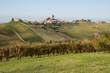 Hamlet on the hill.
Hamlet on the top of hill; the hill is full of vines with autumn colors. Langhe area, Piemonte, Italy.