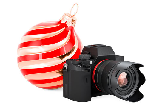 Christmas Photo Session concept. Digital camera with Christmas ball. 3D rendering