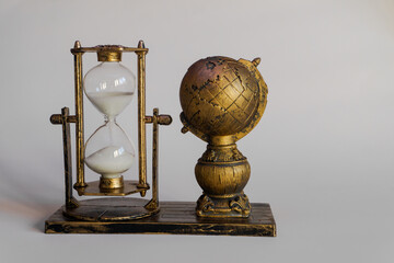 Earth and Hourglass. The symbolism of hourglasses