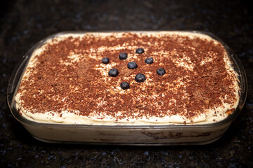 Classic tiramisu, dessert of Italian origin in selective focus
