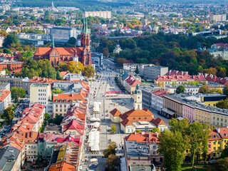 Fototapeta na wymiar Old market, Basilica and sign #Bialystok in Bialystok city aerial view, Poland