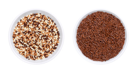 Chocolate nonpareils and sprinkles, in white bowls. Tiny chocolate balls and rod-shaped choco sprinkles, used as sweet decoration and topping for cookies, cakes and ice cream. Isolated, from above.