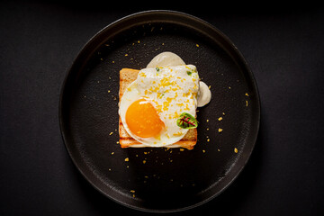 sandwich with egg and melted cheese