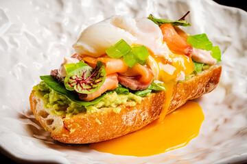Poached egg with smoked salmon and avocado on toast
