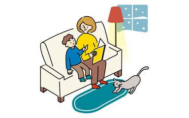 冬の夜に絵本を読む親子