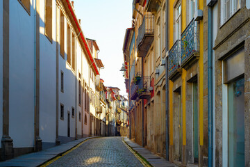 Evening sun narrow street Porto - 557486814