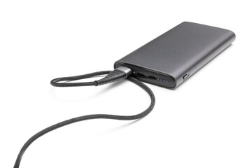 Fully charged portable powerbank with two usb outputs isolated on a white background. Powerbank for charging mobile devices.