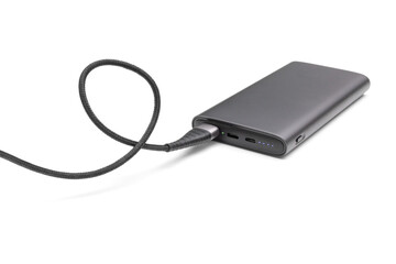 Fully charged portable powerbank with two usb outputs isolated on a white background. Powerbank for charging mobile devices.