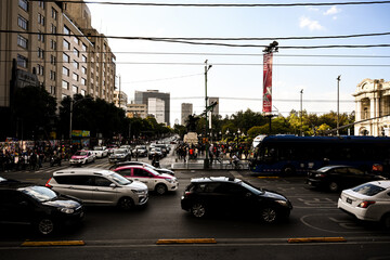 Rush hour in Mexico city in front of the palace of fine arts - art and architecture - travel