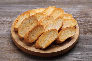 Tasty hard chuck crackers on wooden table