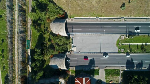 Bird's-eye drone view of Izmir Belkahve Tunnels and cars passing through the tunnel