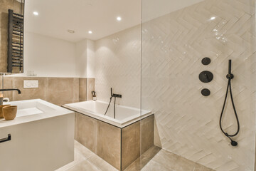 a modern bathroom with white tiles and black fixtures on the shower wall, along with a bathtub in...