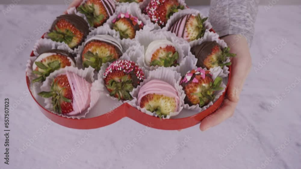 Sticker Step by step. Heart-shaped box with chocolate dipped strawberries.