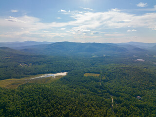 Tenney Mountain aerial view in summer with Groton Wind Power field at the background in Plymouth, New Hampshire NH, USA. 