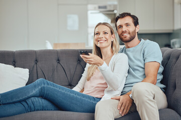 Couple, home and watch television, happy on sofa with streaming movie or tv show, smile with remote...