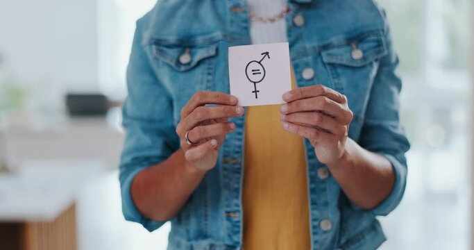 Gender equality, pay gap and woman with a sign in the office with a female and male symbol. Business, equity and girl employee with a feminism card in protest for equal salary, opportunity and equity