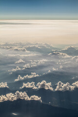 aerial view of the alps, Mont Blanc , snowy mountains with fluffy clouds, panoramic mountain