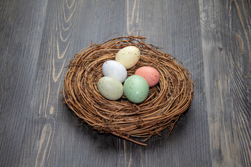 Nest with Easter pastel color eggs