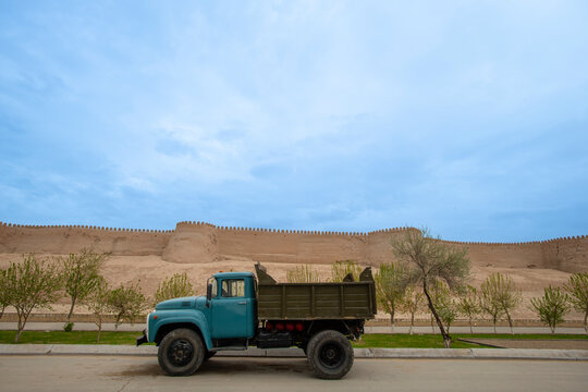a truck oytside the old city walls of khiva, uzbekistan