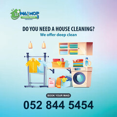 Cleaning service with professional equipment during work An employee of a professional cleaning service in overalls washes the glass of the windows of the facade of the building.