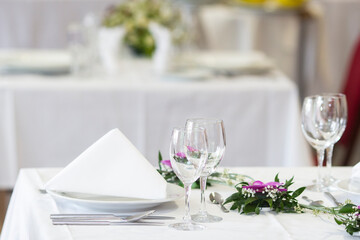 Served dinner table in a restaurant. Restaurant interior