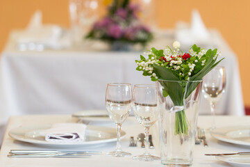 Served dinner table in a restaurant. Restaurant interior