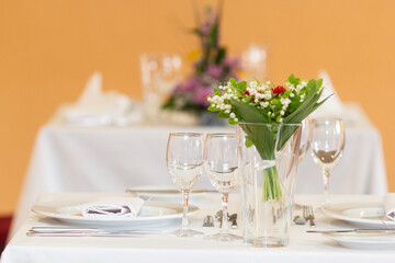 Served dinner table in a restaurant. Restaurant interior