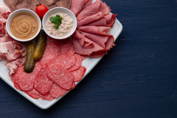 meat dish, sliced sausage, bacon and meat