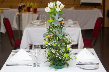 Served dinner table in a restaurant. Restaurant interior
