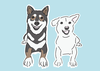 座っている2匹の犬