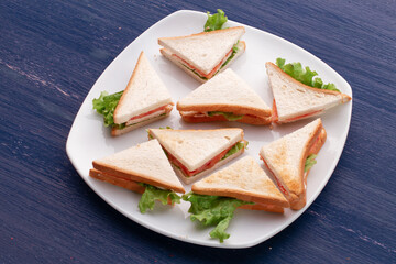 eight sandwiches on the board