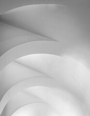 abstract architecture of a white ceiling with arches