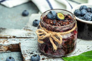 blueberry jam in a jar. Homemade food concept. place for text, top view