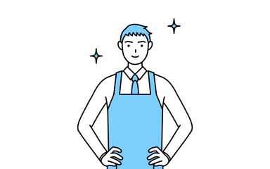 両手を腰に当てたエプロンを着た男性