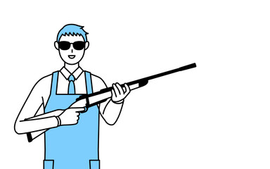 Fototapeta premium サングラスをかけてライフル銃を持つエプロンを着た男性