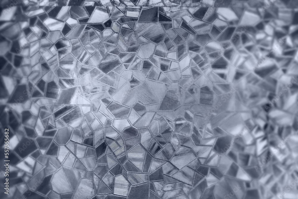 Poster embossed glass background. corrugated glass monochrome. refraction of light in a bumpy transparent s