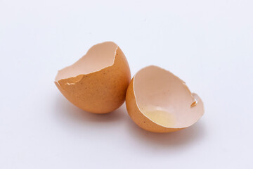 selective focus Cracked eggshell pile, crushed egg shells isolated on white background