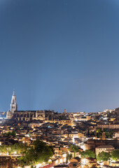 Toledo downtown and cathedral at night under the stars