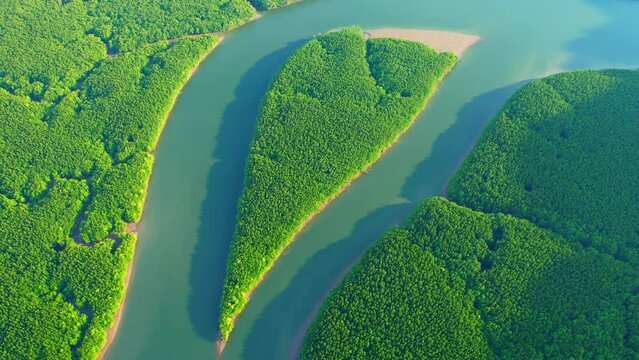 Mangrove forests and meandering rivers. Ao Phang Nga National Park is world renowned for the white sandy beaches and crystal clear water. popular destination for travellers from around the world. 4K
