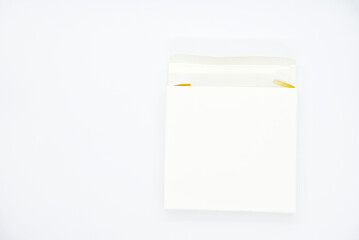 White paper box on a white background. White cardboard packaging.